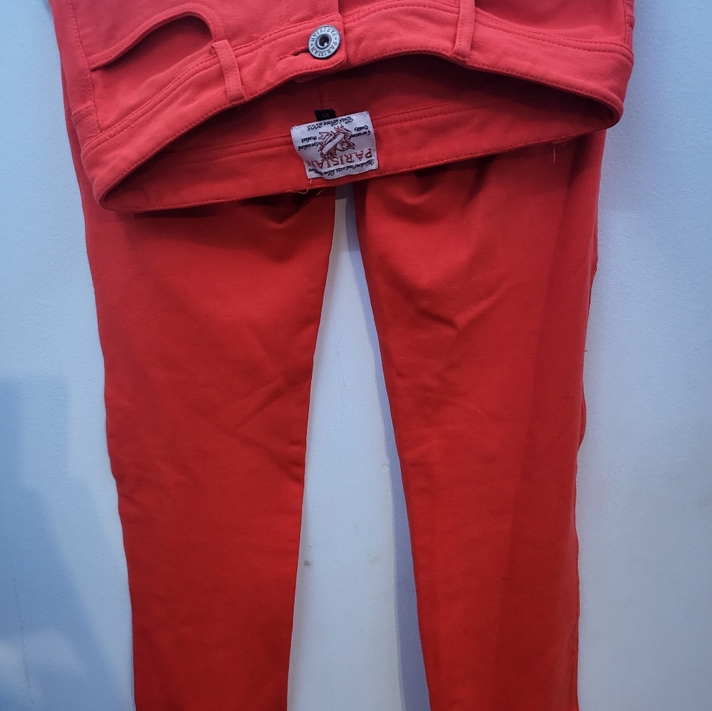 Bold and bright y2k orange skinny jeans